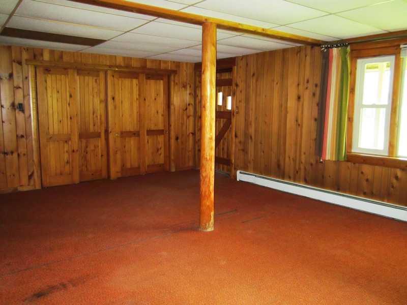 135 Hanson Lake Road Mapleton, ME 04757 - Photo 9 of 10 Living Room. Walk-out basement...