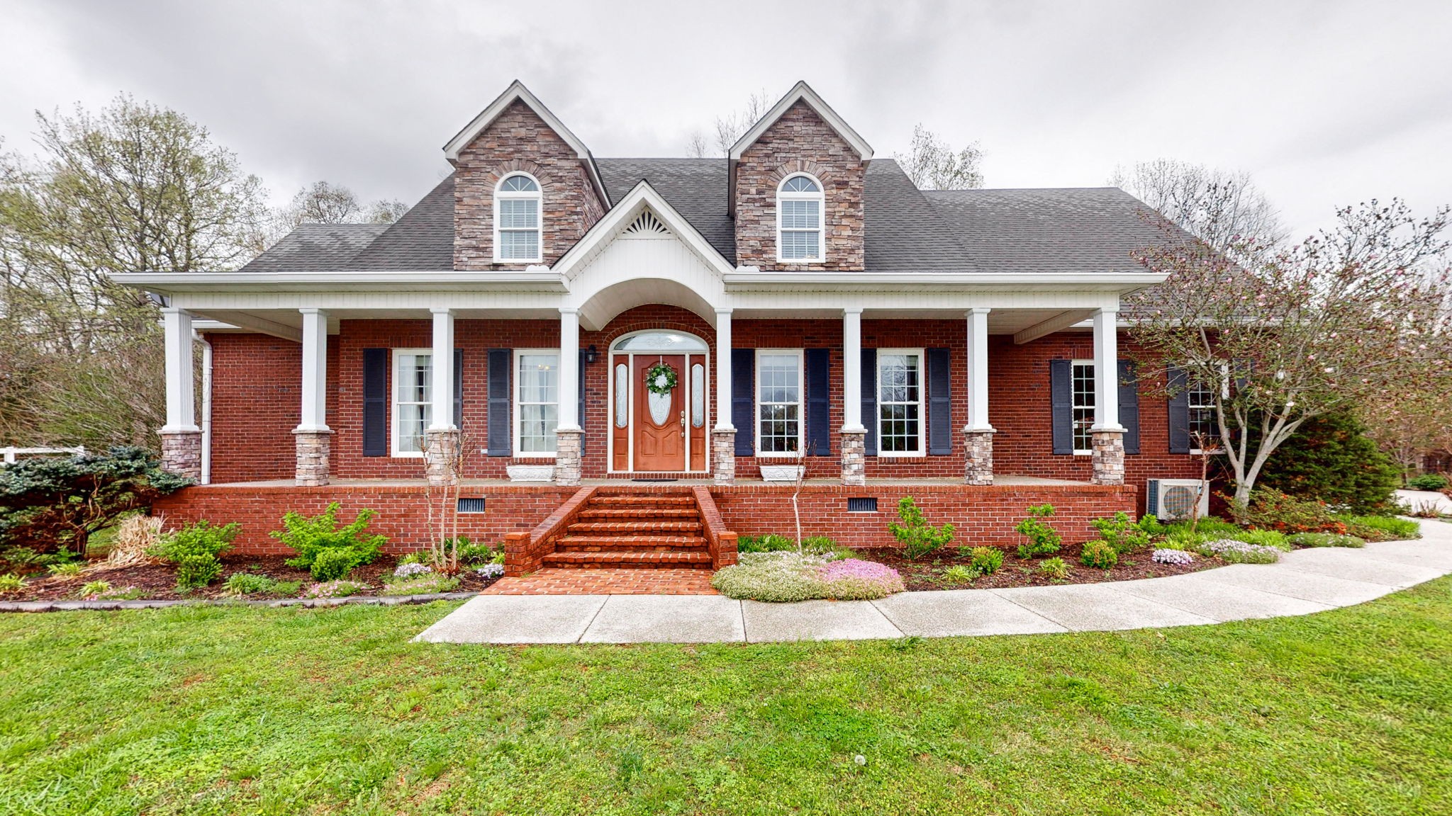 3664 Whippoorwill Road Lebanon, TN 37090 - Photo 13 of 69 a front view of a house with yard and green space