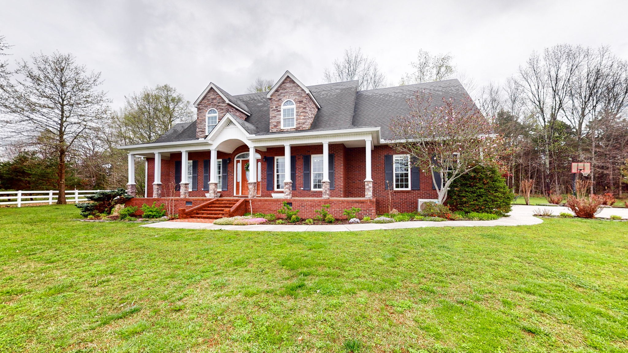 3664 Whippoorwill Road Lebanon, TN 37090 - Photo 15 of 69 a view of a house with a yard and chairs
