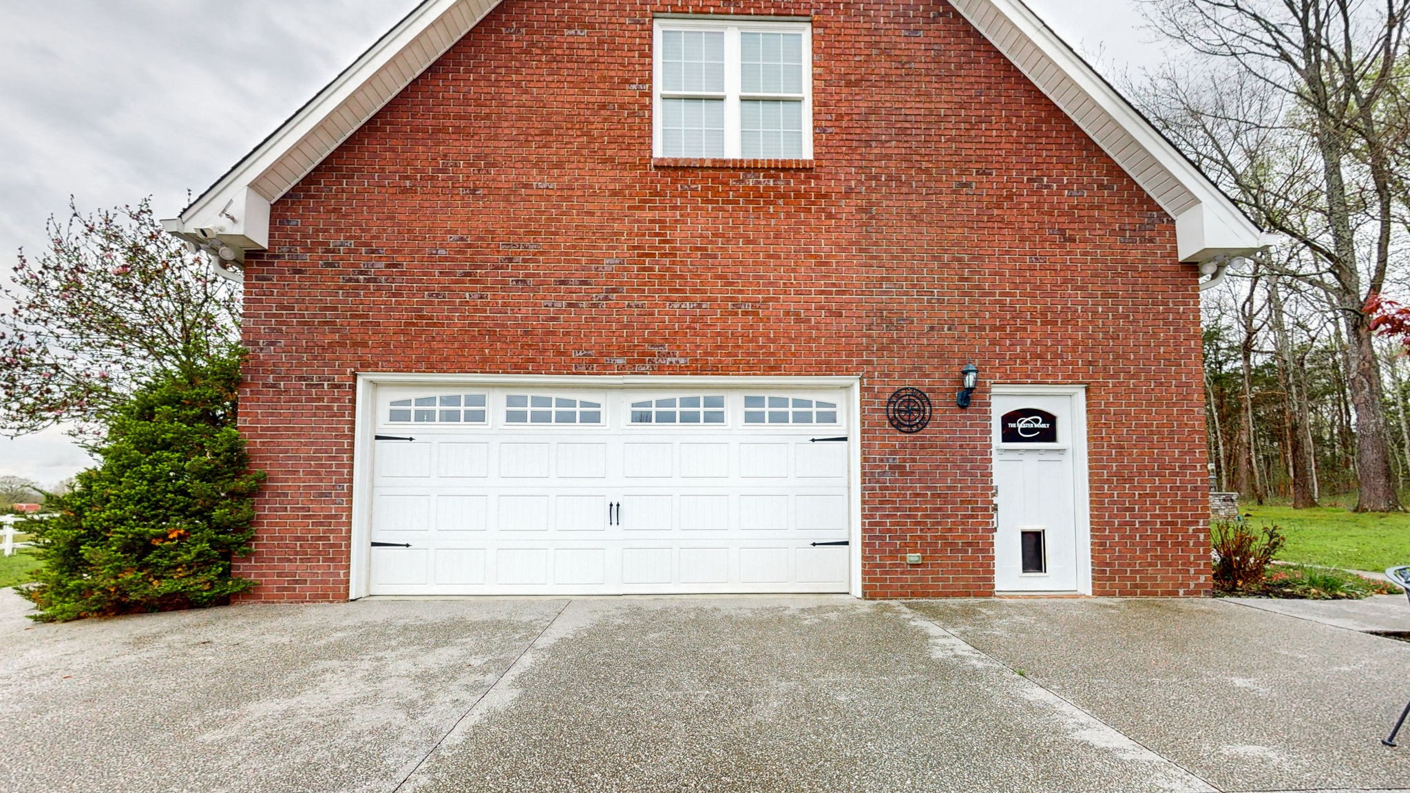 3664 Whippoorwill Road Lebanon, TN 37090 - Photo 21 of 69 a front view of a house with a yard and garage