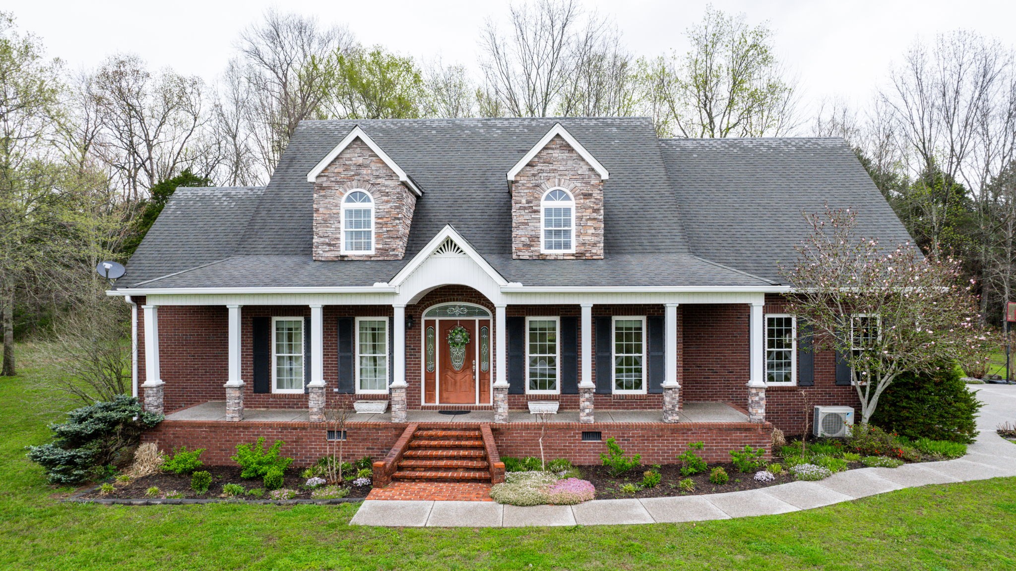3664 Whippoorwill Road Lebanon, TN 37090 - Photo 27 of 69 a front view of a house with garden