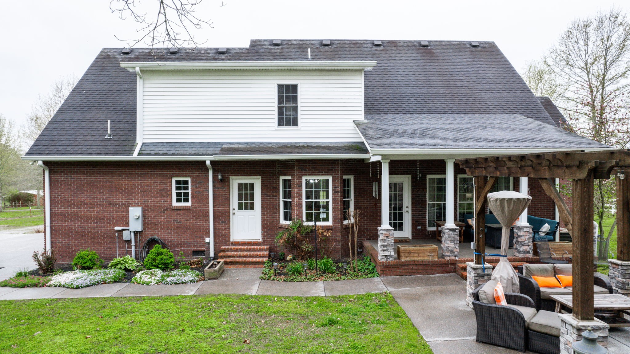 3664 Whippoorwill Road Lebanon, TN 37090 - Photo 30 of 69 a front view of a house with porch and garden