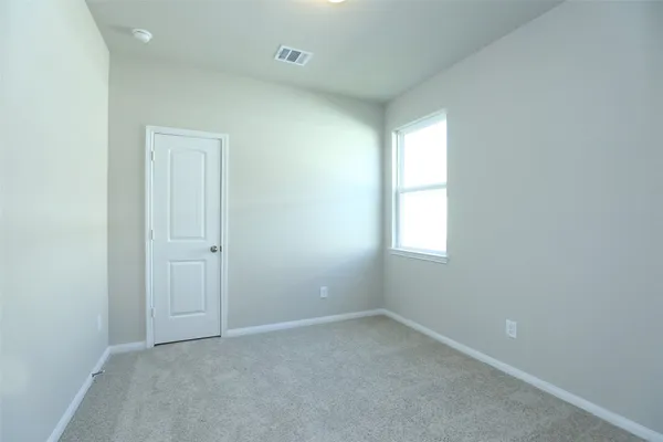 an empty room with a window