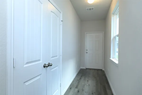 a view of a kitchen with a sink and a stove top oven
