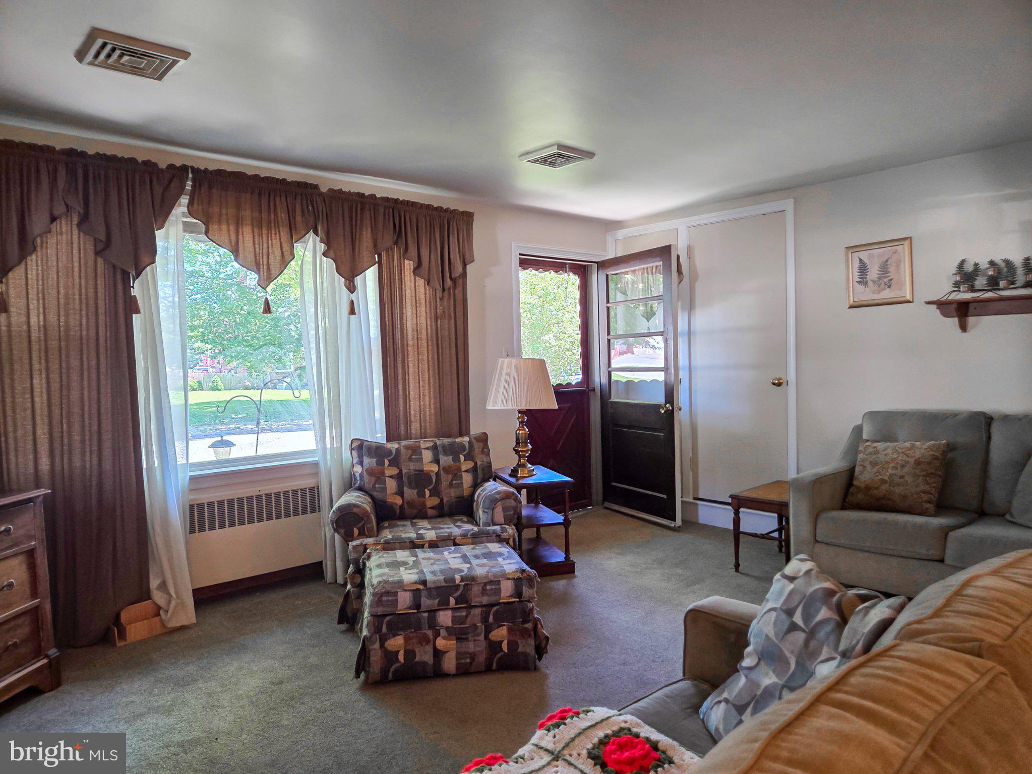 524 Locust Street Denver, PA 17517 - Photo 7 of 36 Inviting living space with natural light.