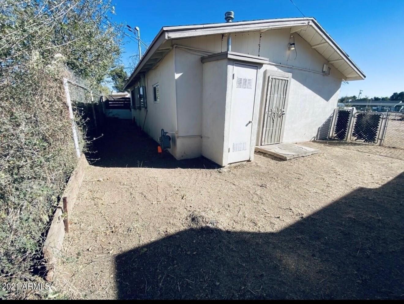 1522 East 9th Street Douglas, AZ 85607 - Photo 11 of 13 a view of a house with a yard