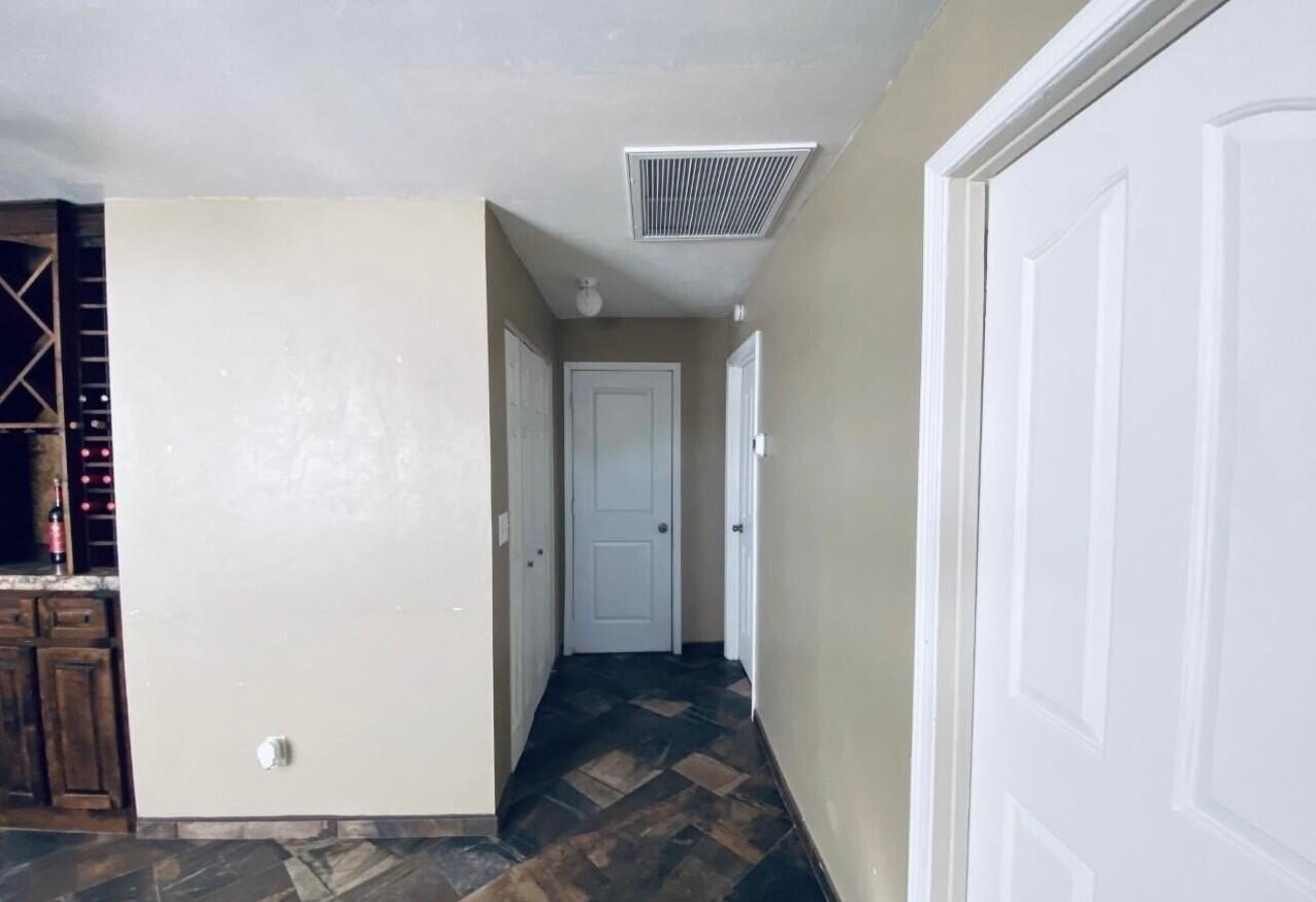 1522 East 9th Street Douglas, AZ 85607 - Photo 6 of 13 a view of a hallway with wooden floor