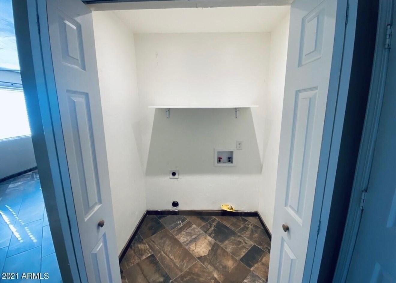 1522 East 9th Street Douglas, AZ 85607 - Photo 8 of 13 a view of a hallway to a bedroom