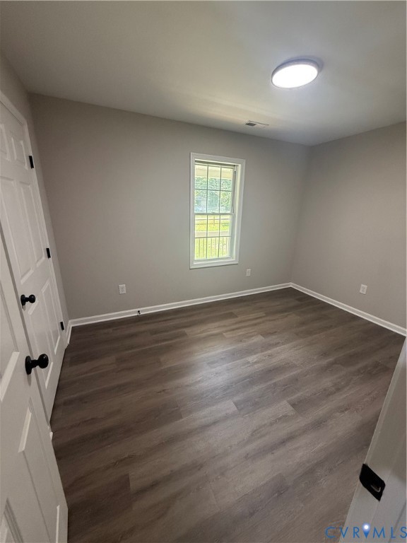 3430 The Loop Road Henrico, VA 23231 - Photo 12 of 26 Wood-finish flooring, white trim, and a ceiling-mo