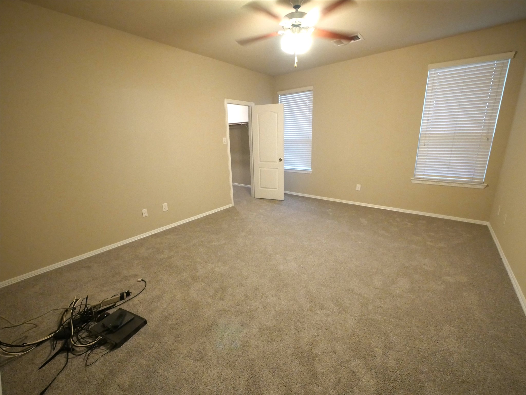9843 Swindale Ridge Lane Houston, TX 77044 - Photo 9 of 17 Comfortable primary retreat with a peaceful atmosphere and plenty of space to create your own private sanctuary.