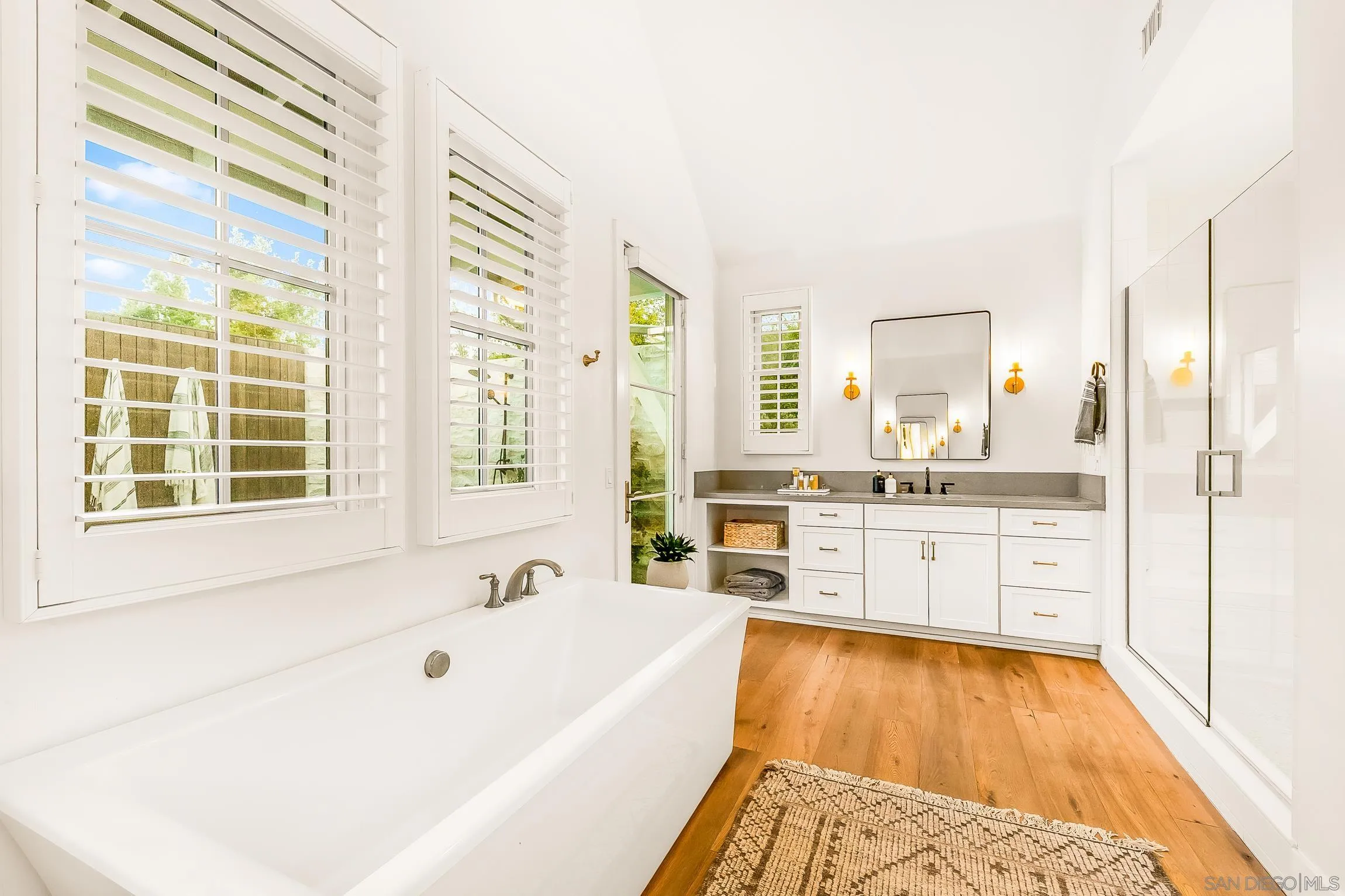 1245 Canton Court Encinitas, CA 92007 - Photo 37 of 71 a bathroom with a tub sink and a window