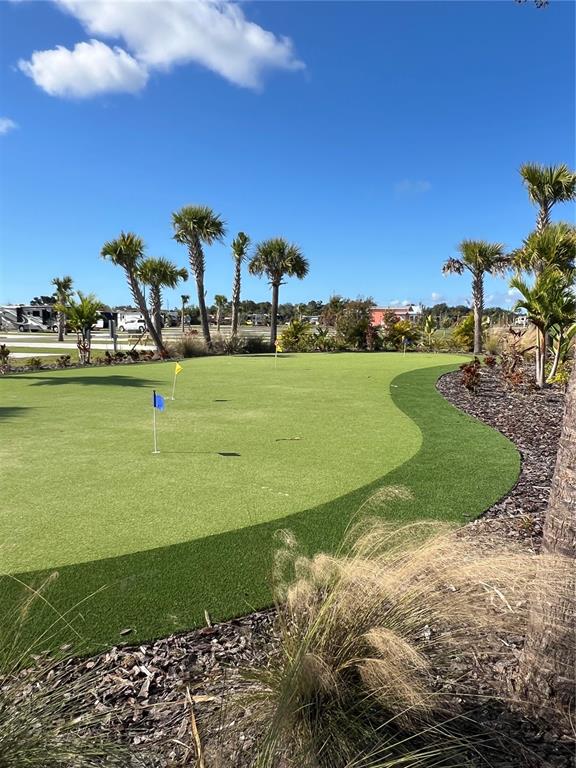 240 Horizon Road Punta Gorda, FL 33982 - Photo 18 of 21 a view of a lake with a building in the background