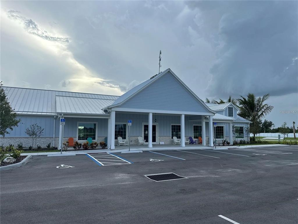 240 Horizon Road Punta Gorda, FL 33982 - Photo 21 of 21 a front view of a building with lots of trees