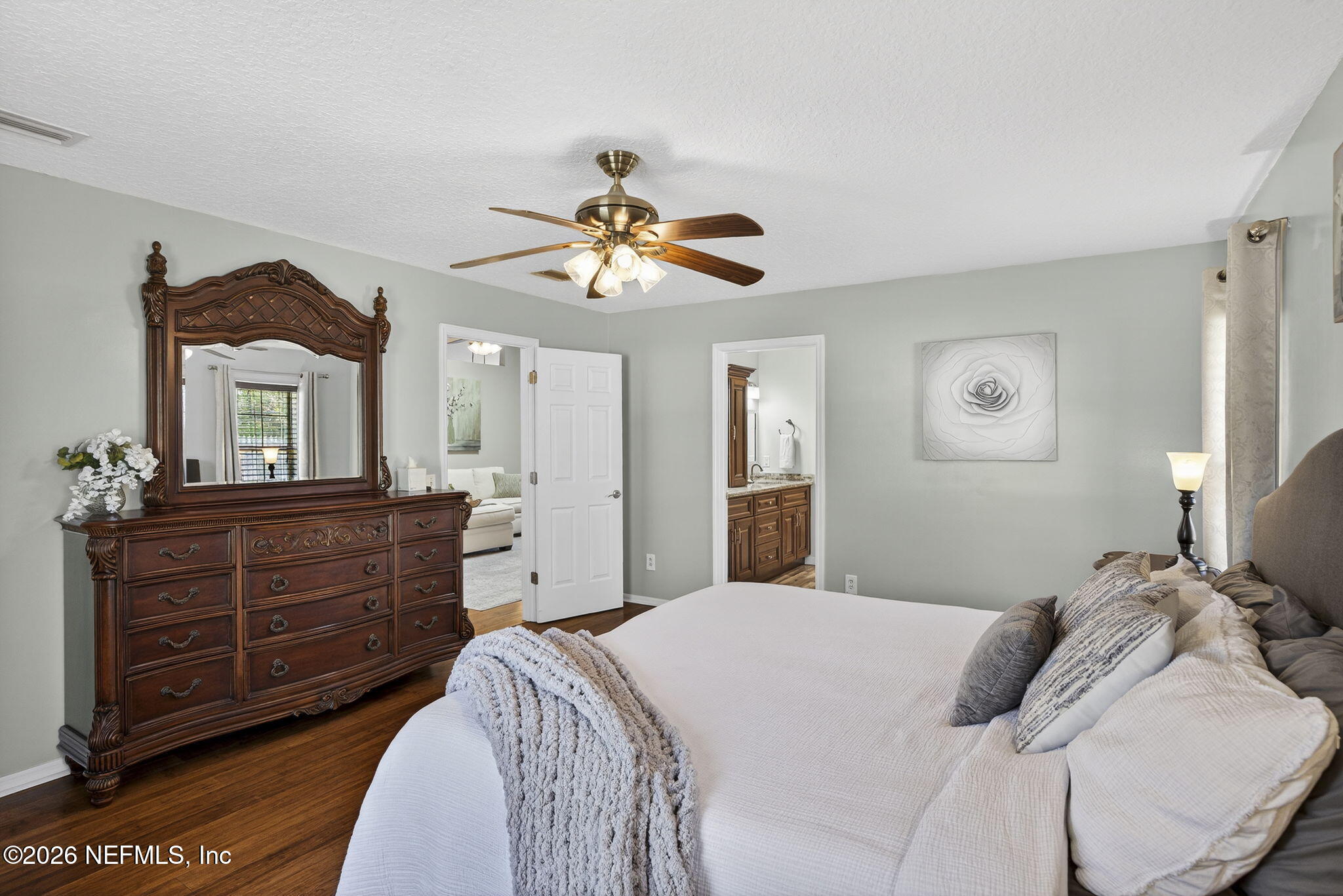 394 Cassandra Lane St. Augustine, FL 32086 - Photo 17 of 43 a bedroom with a bed and a dresser