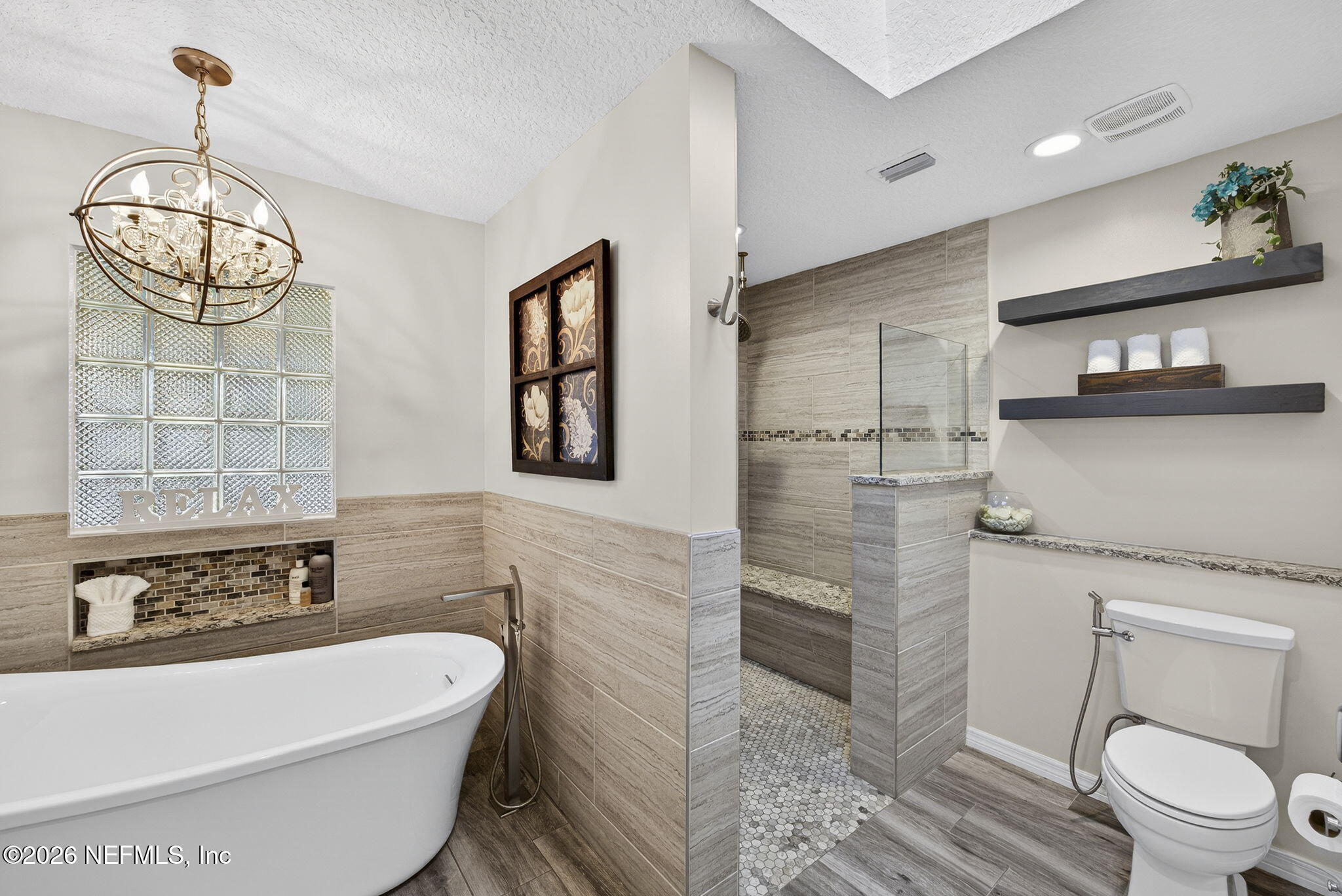 394 Cassandra Lane St. Augustine, FL 32086 - Photo 20 of 43 a bathroom with a bathtub and shower