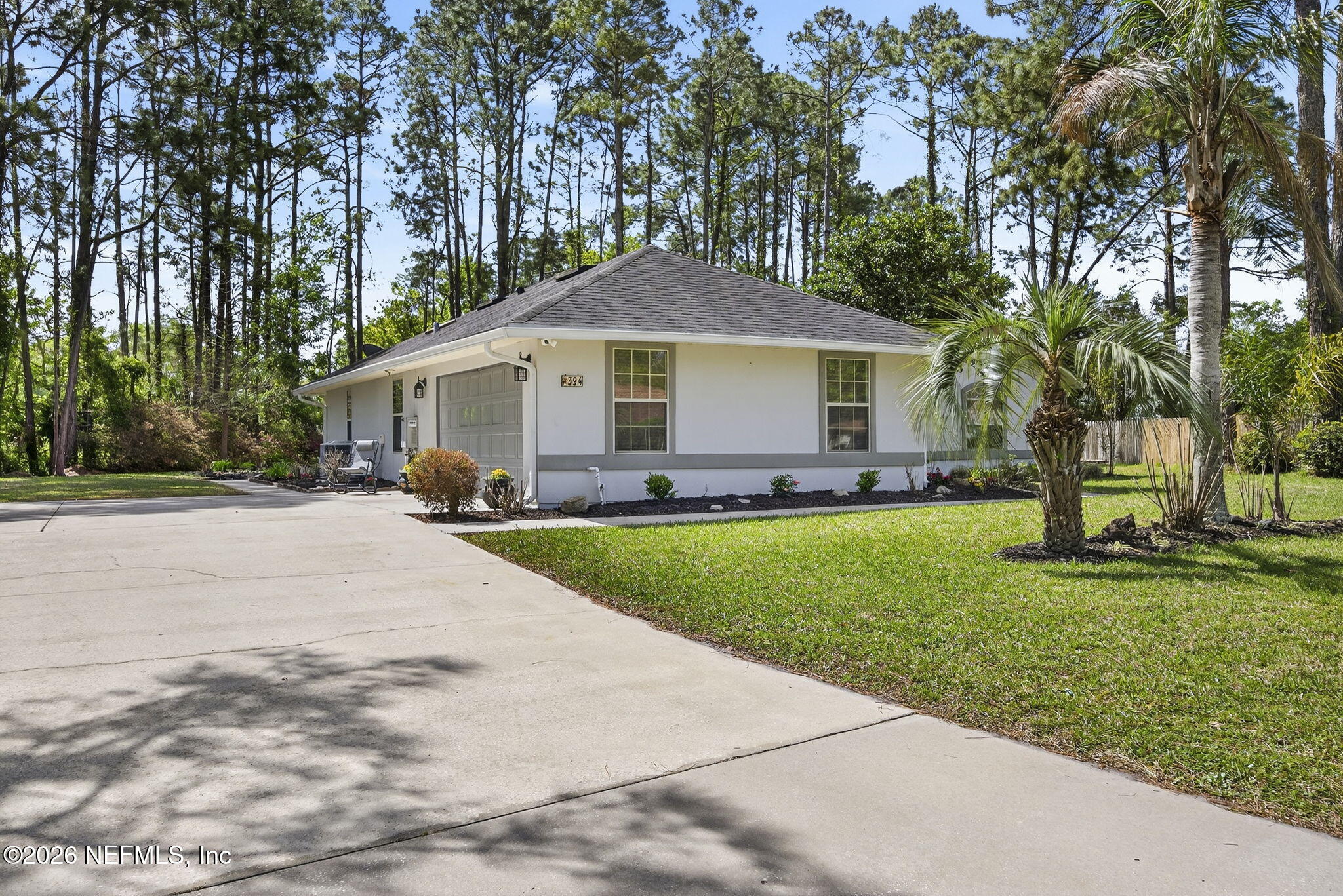 394 Cassandra Lane St. Augustine, FL 32086 - Photo 2 of 43 a front view of a house with a yard