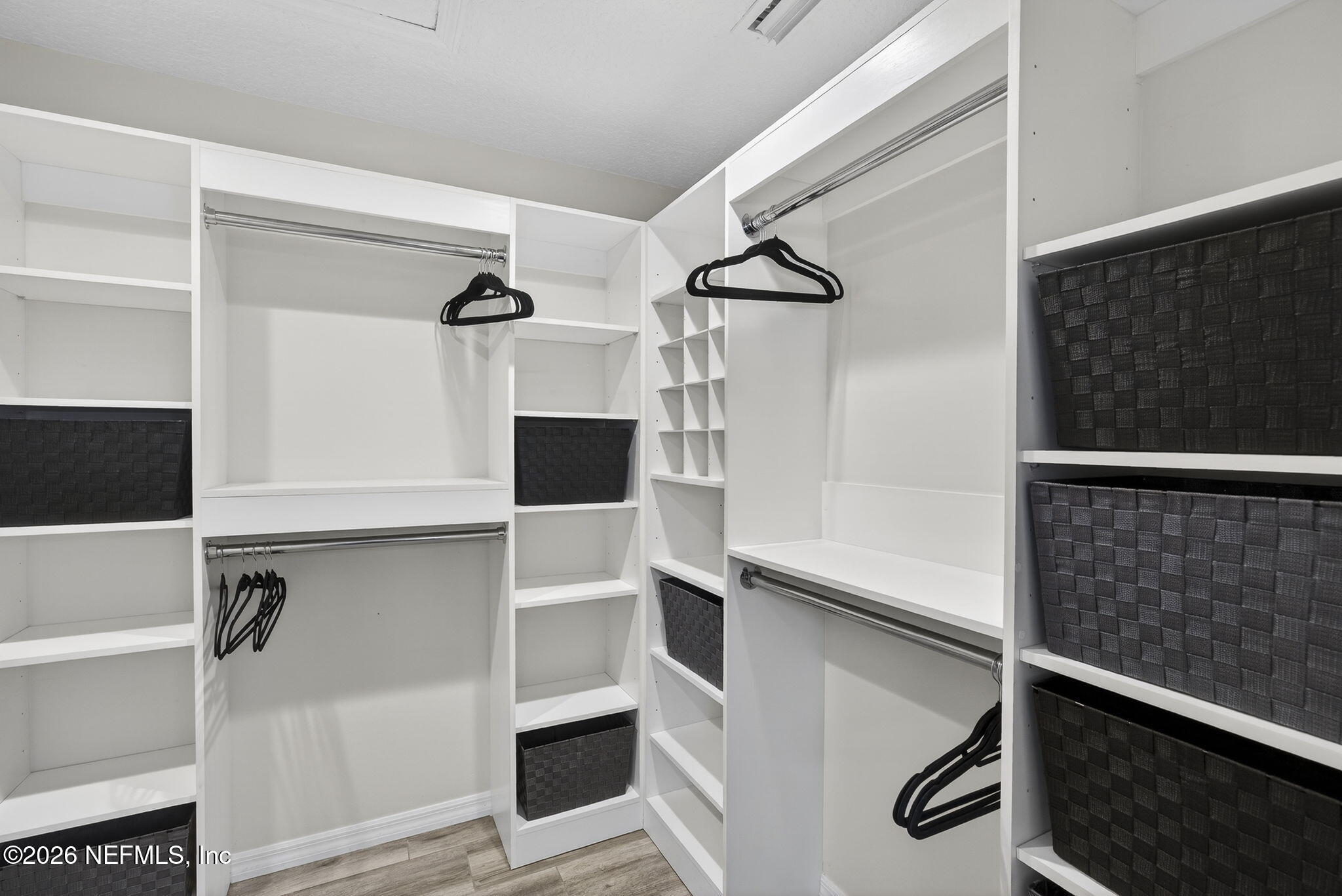 394 Cassandra Lane St. Augustine, FL 32086 - Photo 23 of 43 a view of walk in closet with clothes and window