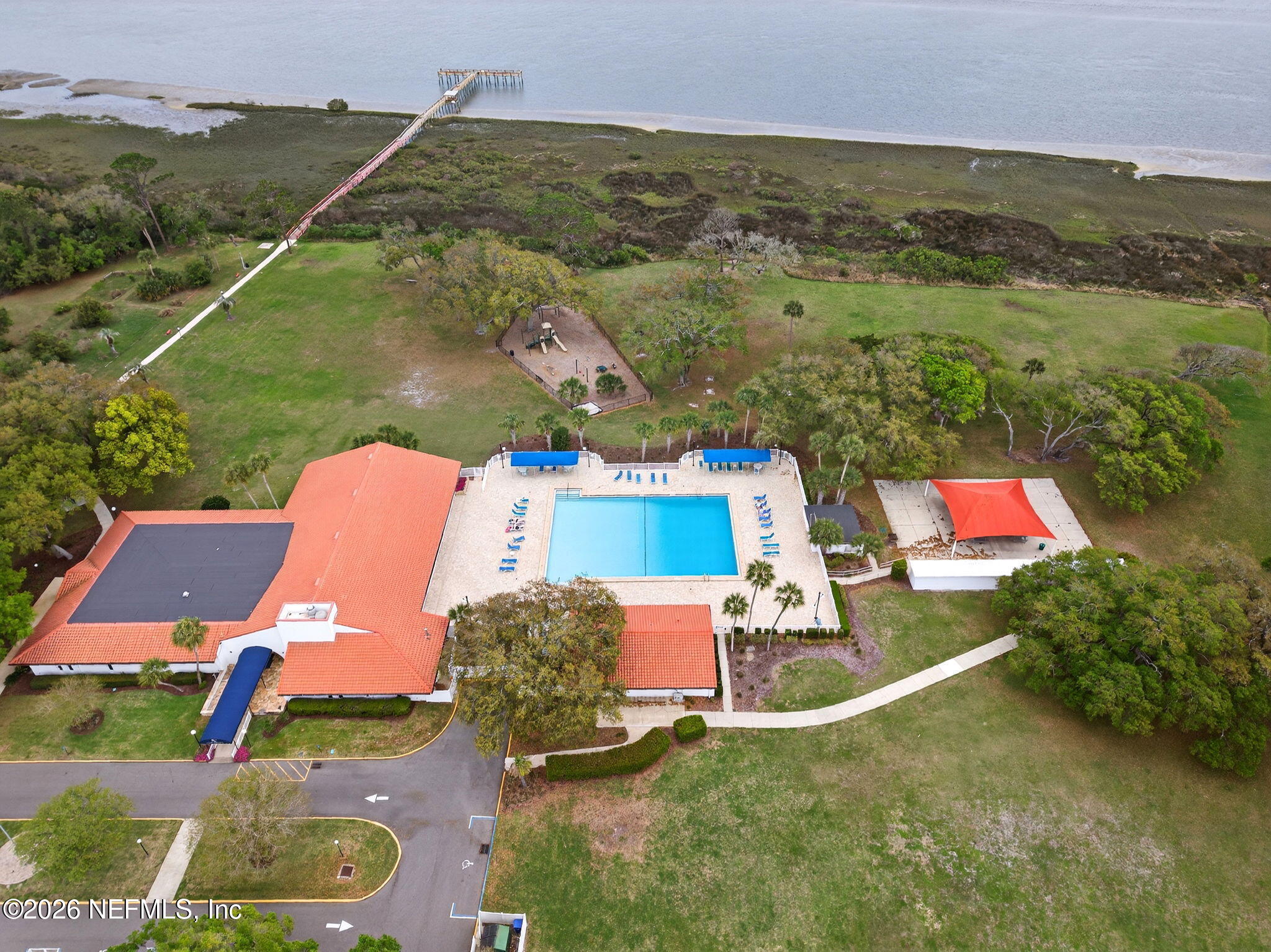 394 Cassandra Lane St. Augustine, FL 32086 - Photo 36 of 43 an aerial view of a house with a yard and lake view