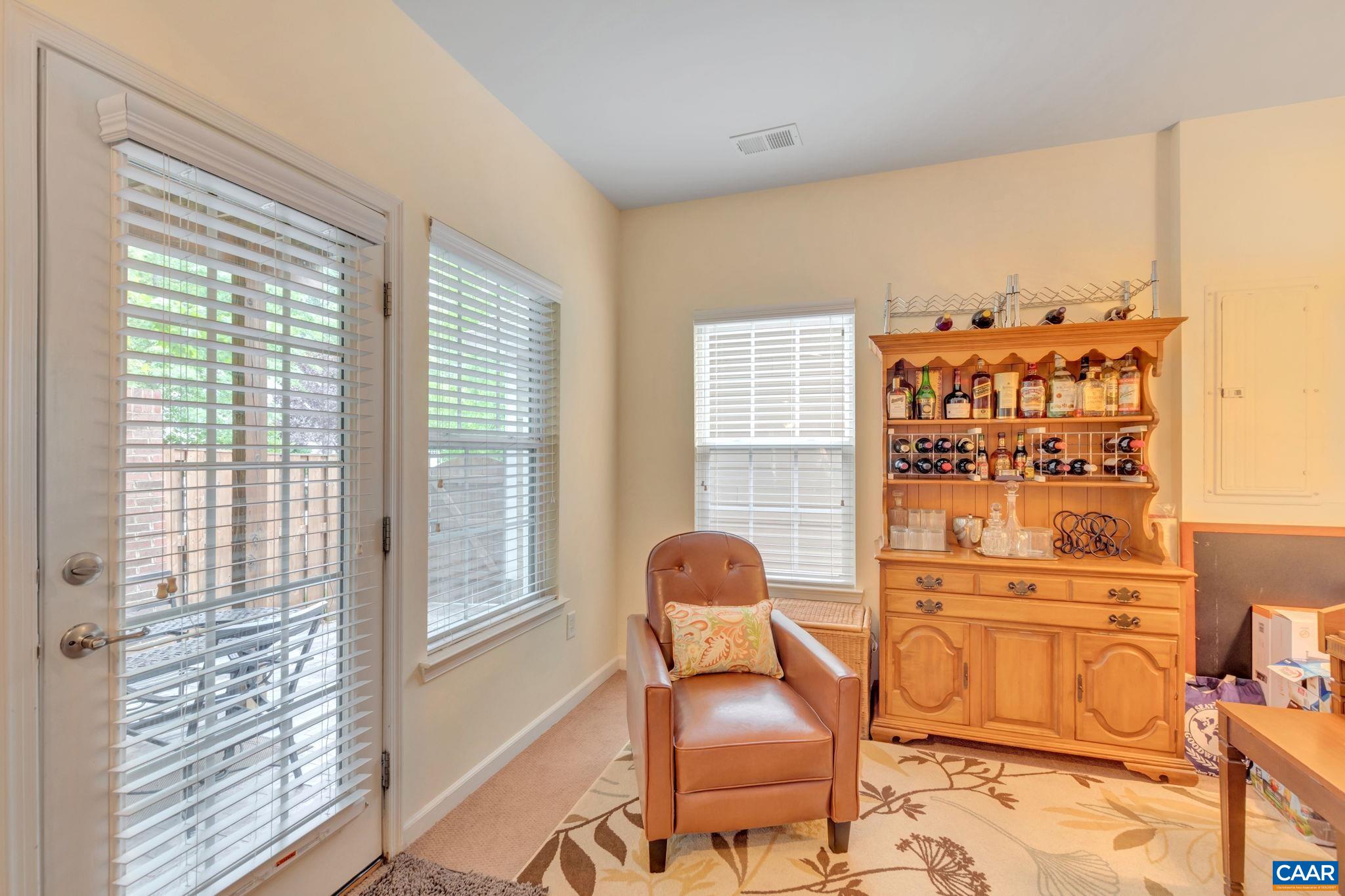 701 Rainier Road Charlottesville, VA 22903 - Photo 11 of 42 a living room with furniture and a window