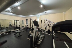 4240 North Clarendon Avenue, Unit 208S Chicago, IL 60613 - Photo 13 of 14 a view of a room with gym equipment
