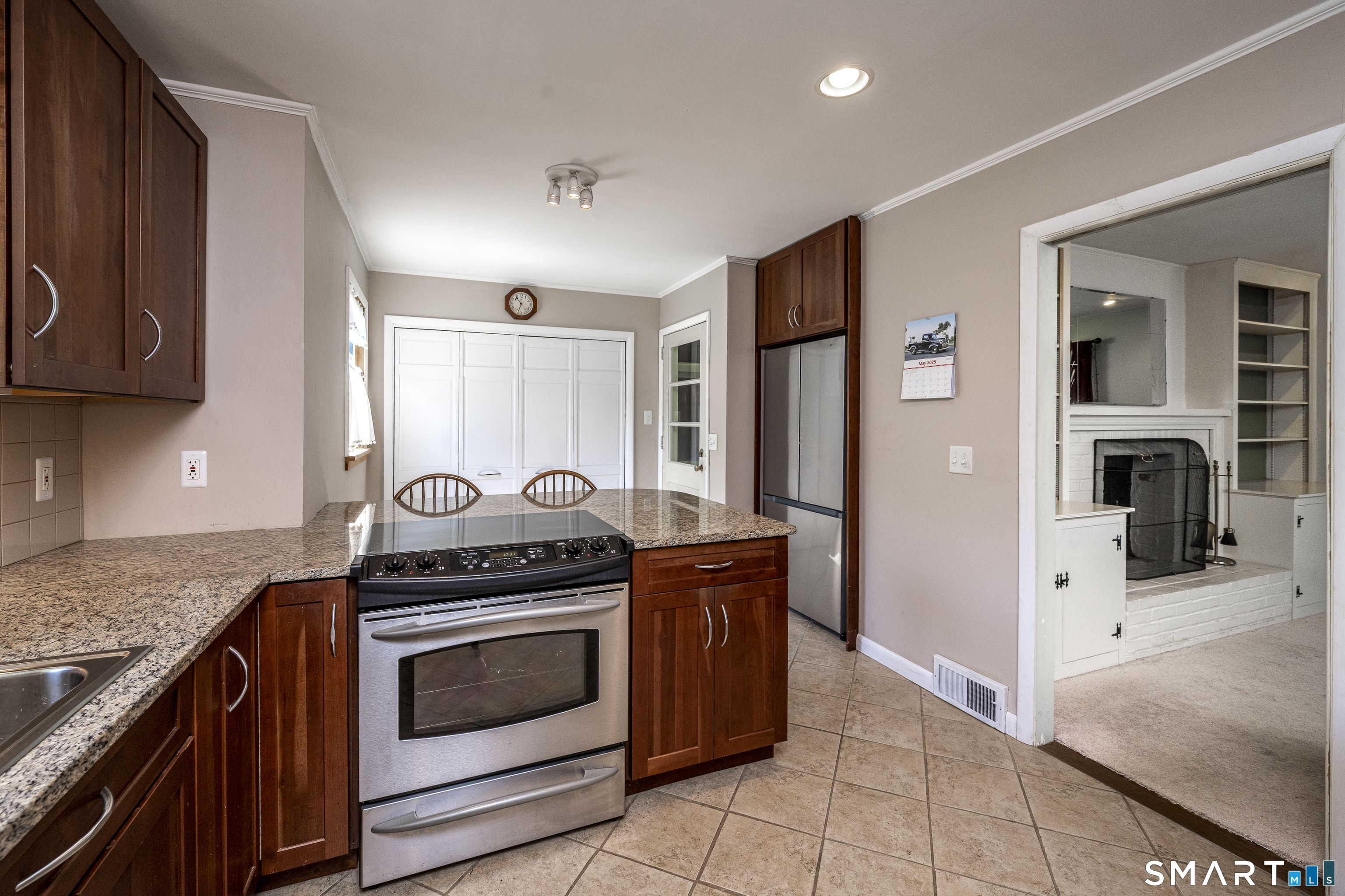 39 Indian Mountain Road Salisbury, CT 06039 - Photo 9 of 16 a kitchen with granite countertop a stove and a sink