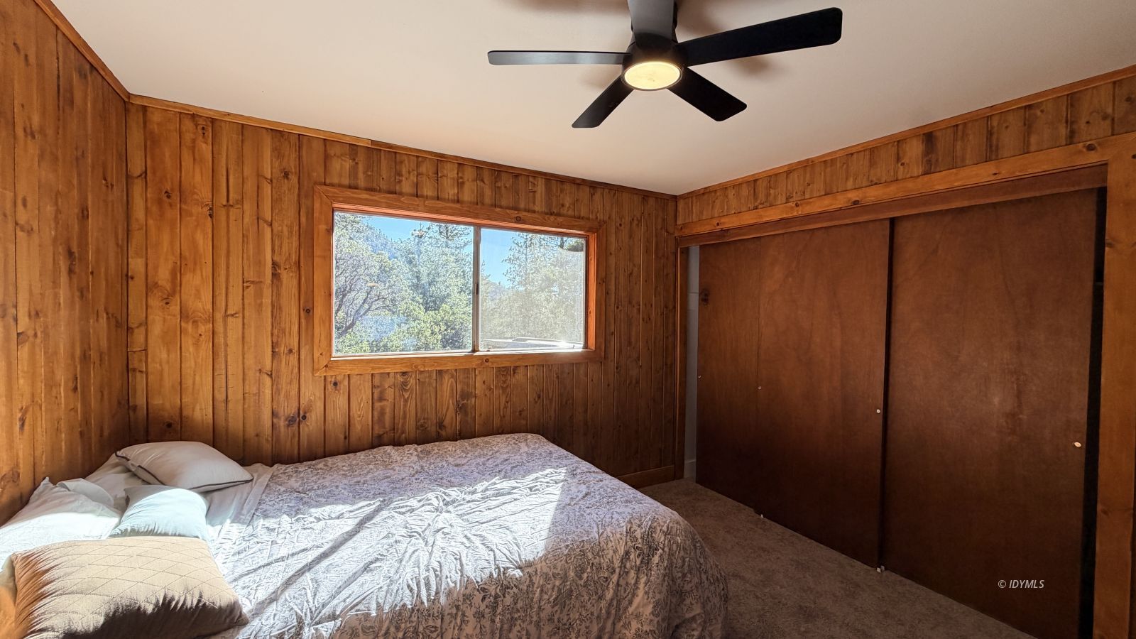 53390 Circle View Drive Idyllwild, CA 92549 - Photo 11 of 22 a bedroom with a bed and a window