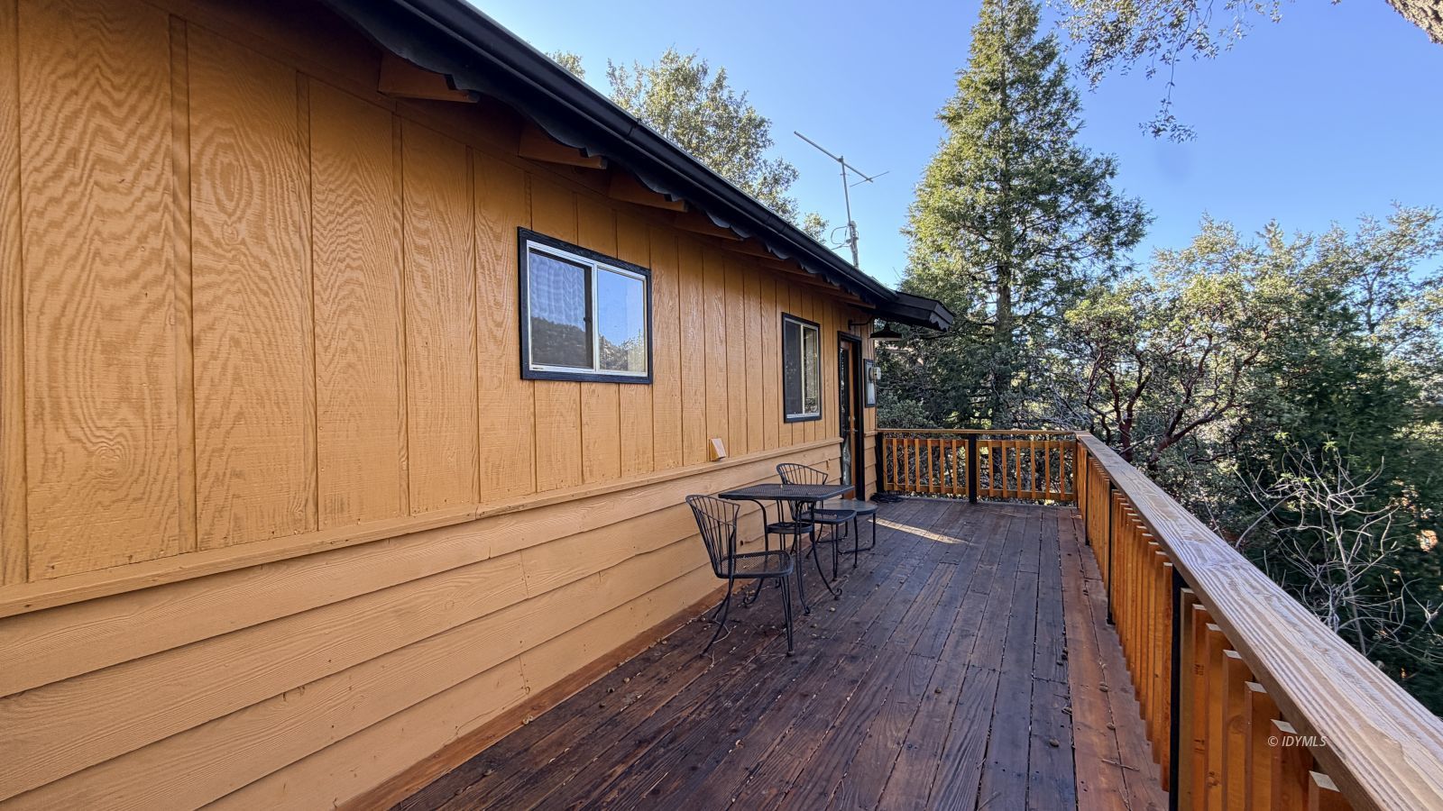 53390 Circle View Drive Idyllwild, CA 92549 - Photo 3 of 22 a balcony with wooden floor and outdoor seating