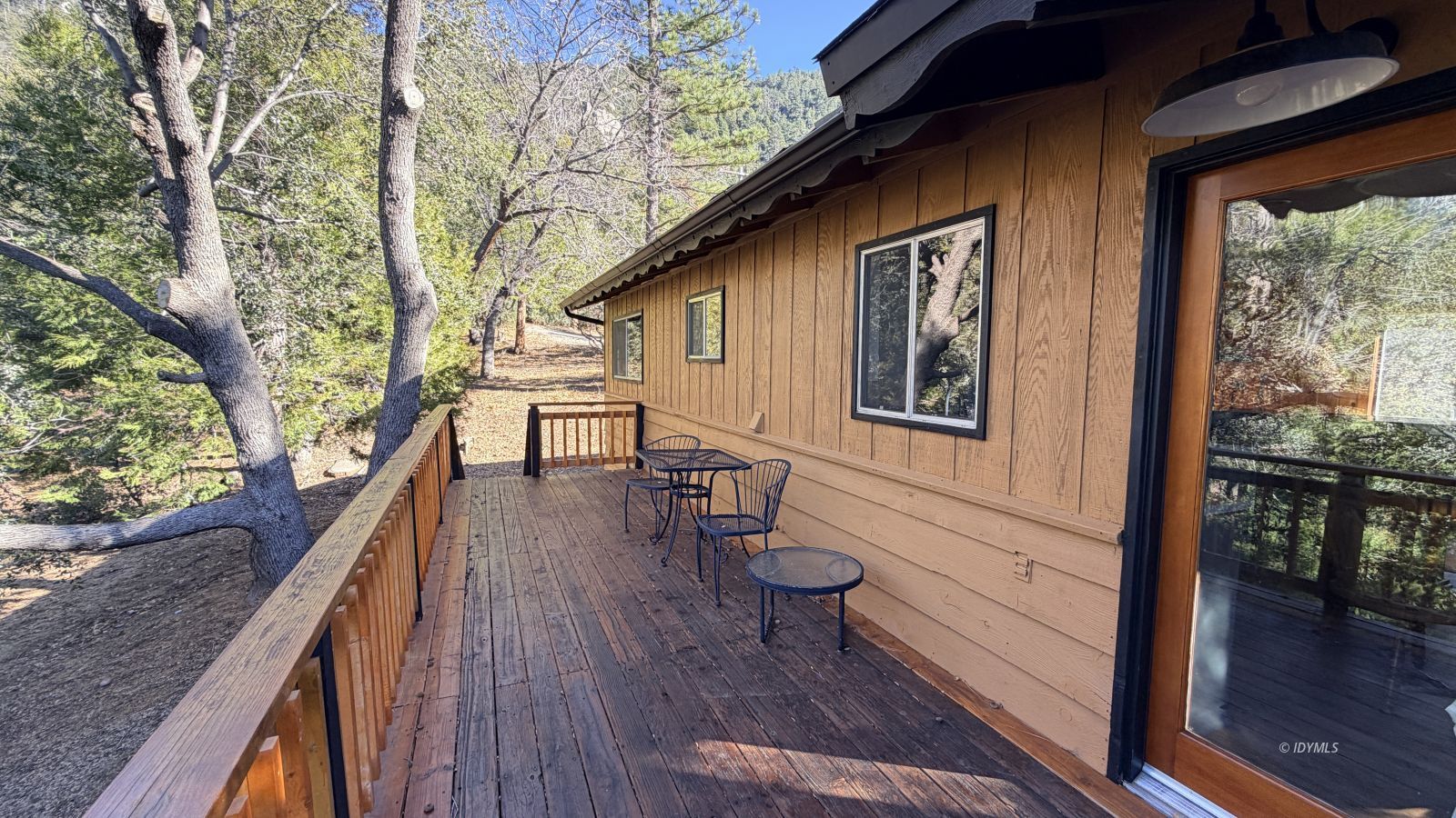 53390 Circle View Drive Idyllwild, CA 92549 - Photo 5 of 22 a balcony with wooden floor and outdoor seating