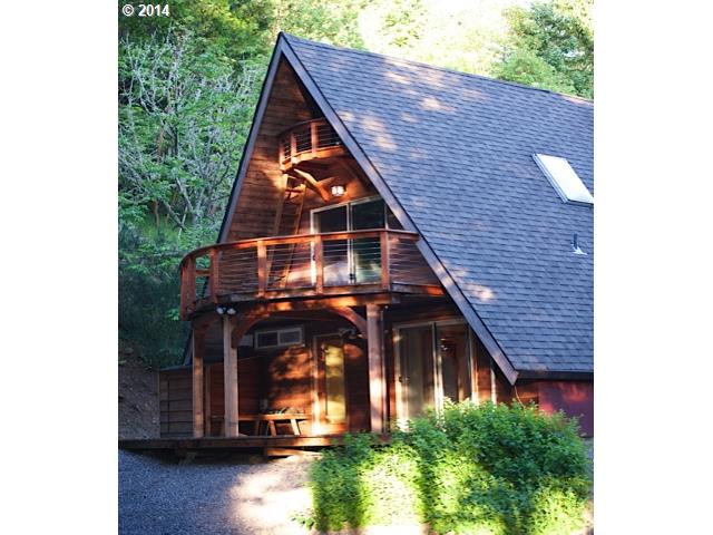 38215 Harolds Road Dexter, OR 97431 - Photo 2 of 16 a view of a house with a small yard