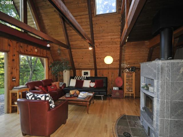 38215 Harolds Road Dexter, OR 97431 - Photo 5 of 16 a living room with furniture and a fireplace