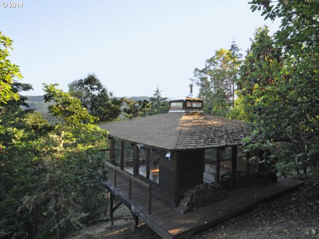 38215 Harolds Road Dexter, OR 97431 - Photo 10 of 16 an aerial view of a house with yard table and chairs