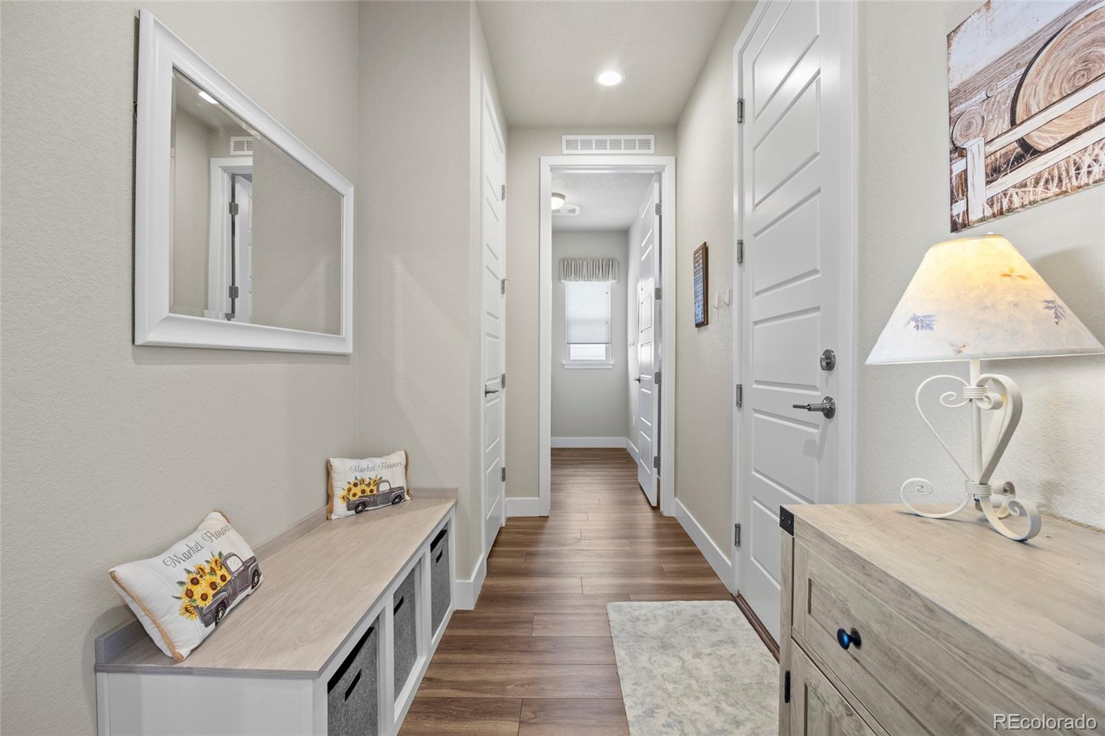 164 Rockingham Circle Castle Pines, CO 80108 - Photo 19 of 43 a bathroom with a double vanity sink and a mirror