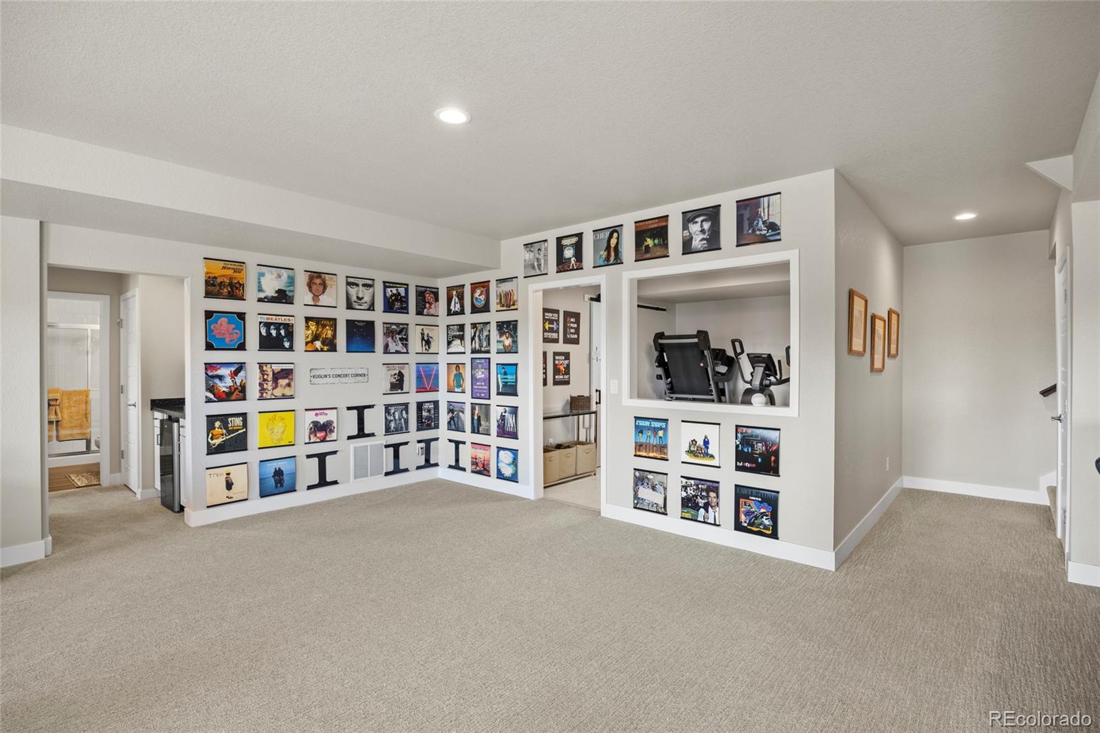 164 Rockingham Circle Castle Pines, CO 80108 - Photo 28 of 43 a living room with a bookshelf and a window