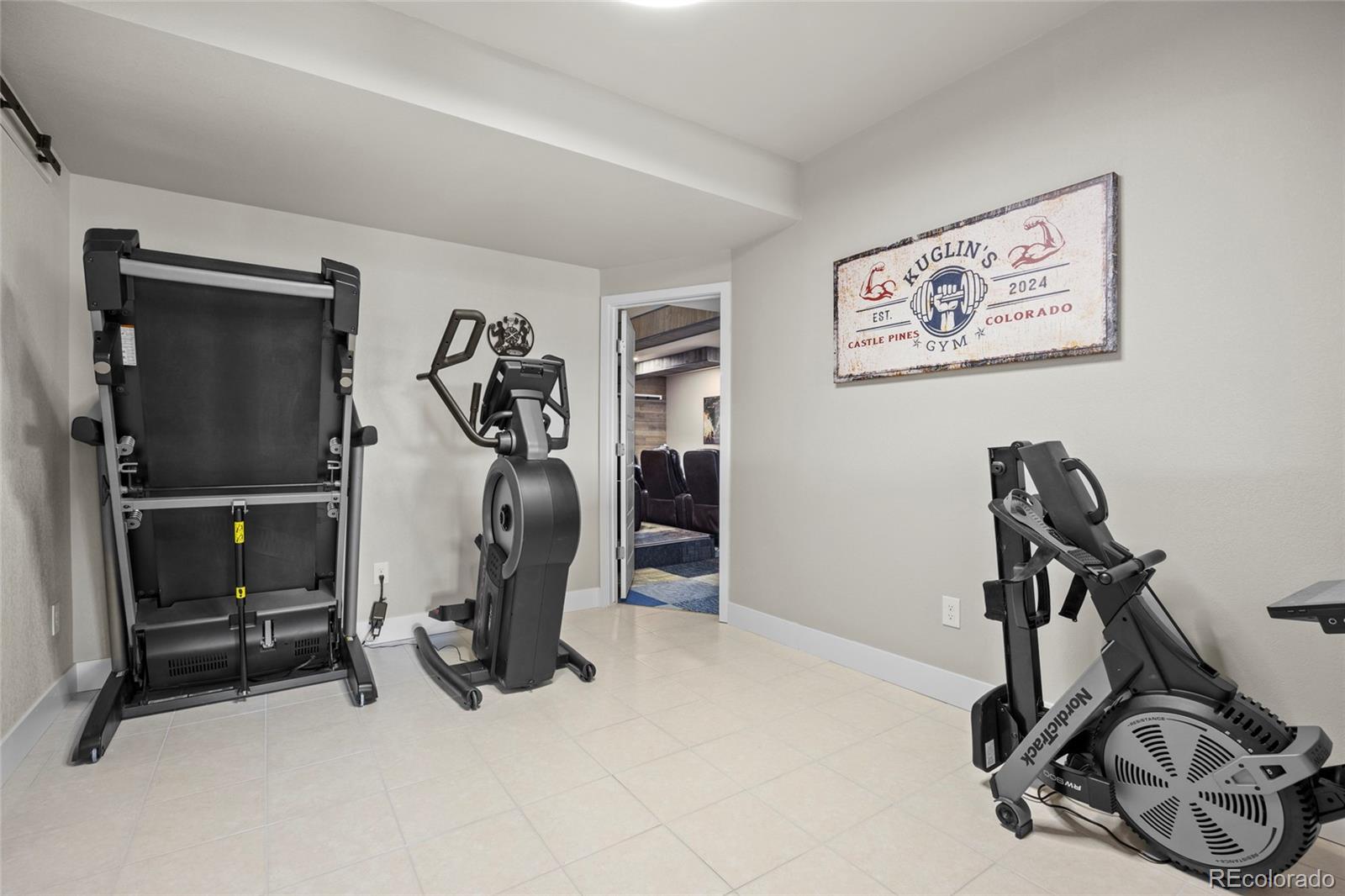 164 Rockingham Circle Castle Pines, CO 80108 - Photo 29 of 43 a view of a room with gym equipment