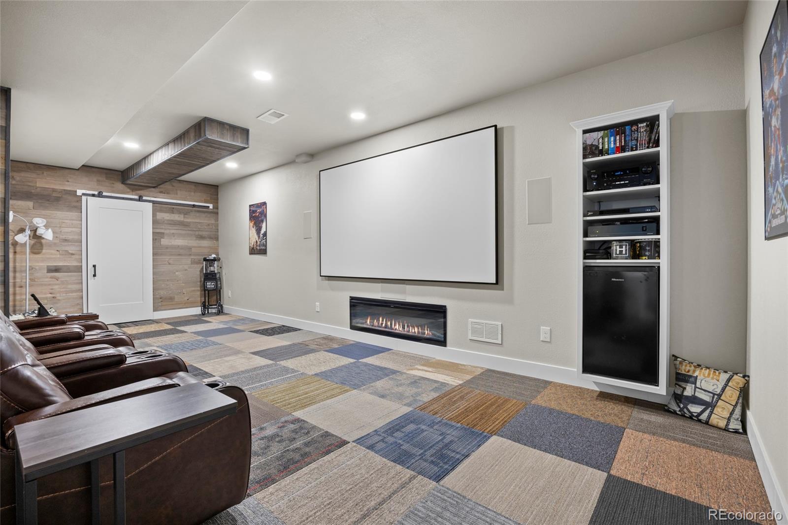 164 Rockingham Circle Castle Pines, CO 80108 - Photo 31 of 43 a kitchen with stainless steel appliances granite countertop a stove and a refrigerator