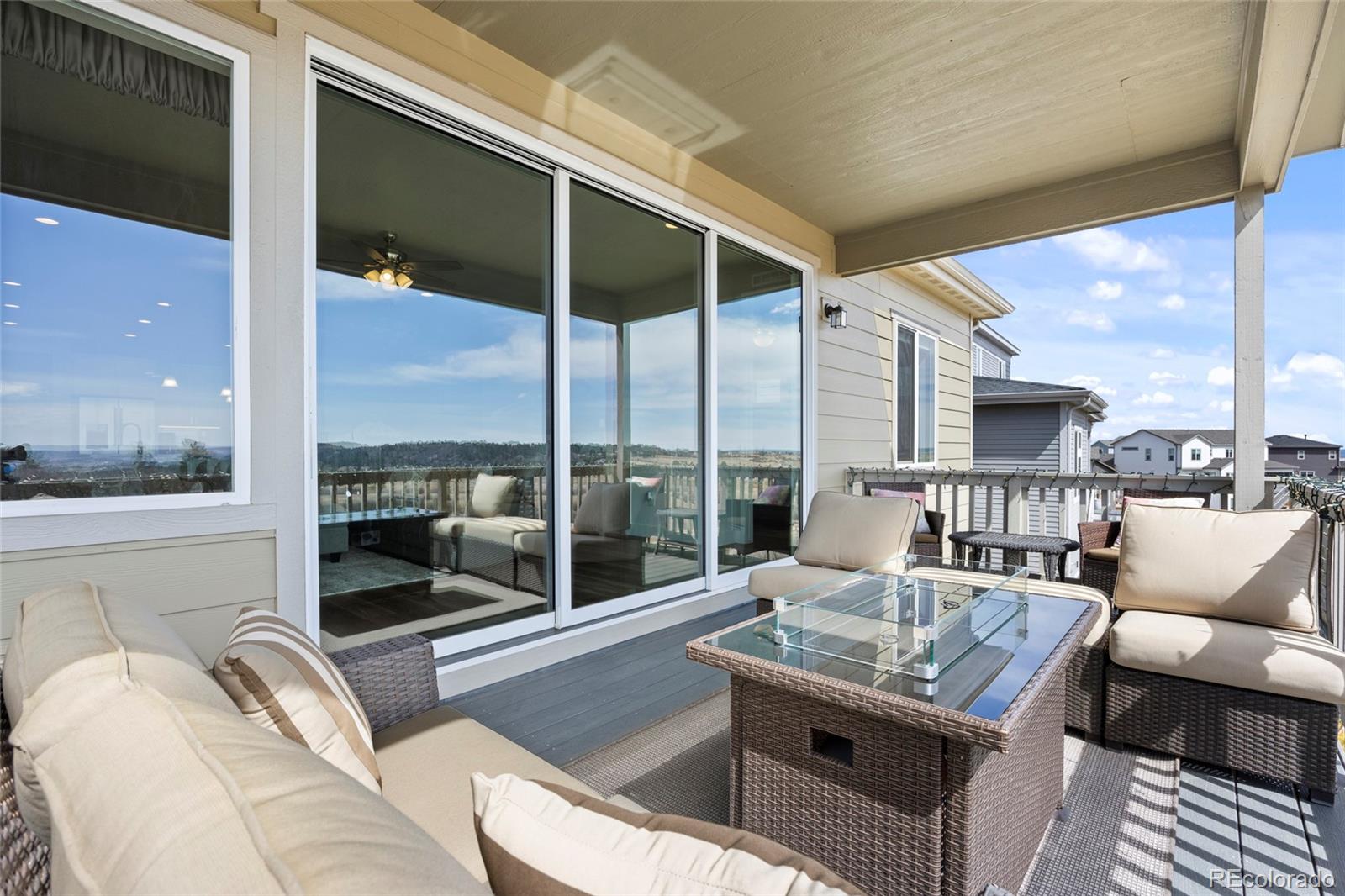 164 Rockingham Circle Castle Pines, CO 80108 - Photo 9 of 43 a living room with furniture