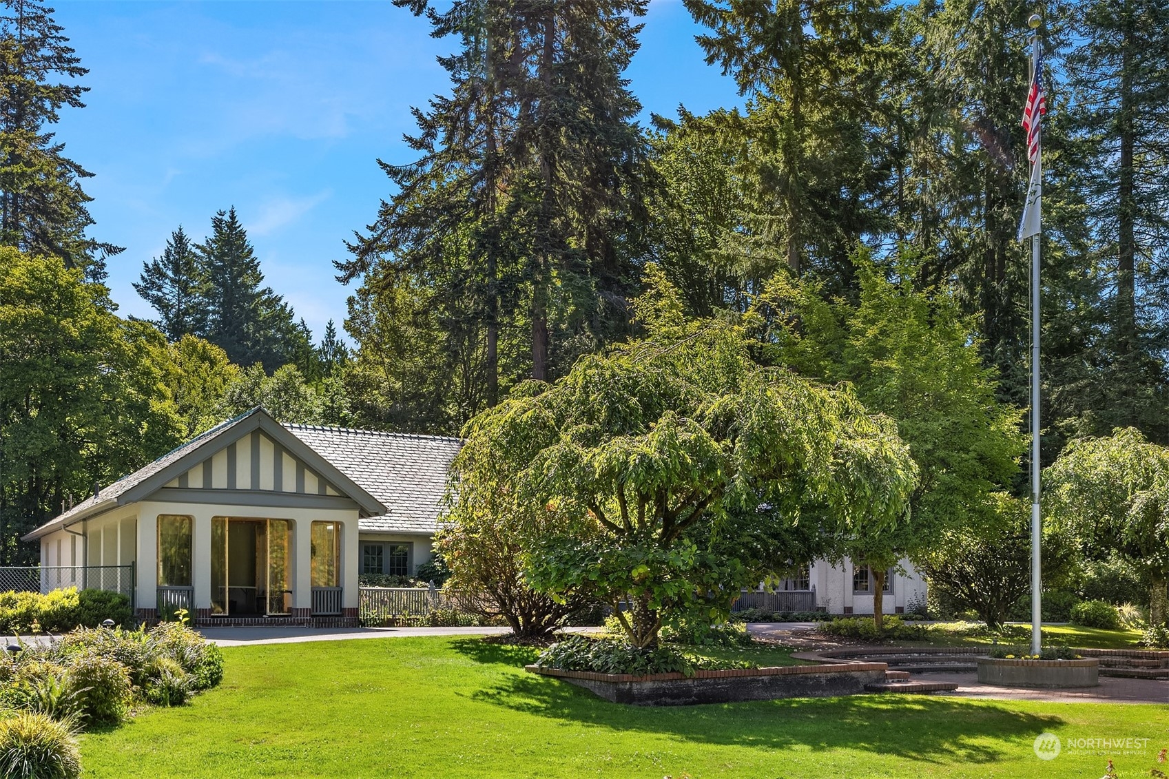 62 Madrona Lane Shoreline, WA 98177 - Photo 7 of 22 a front view of a house with a yard