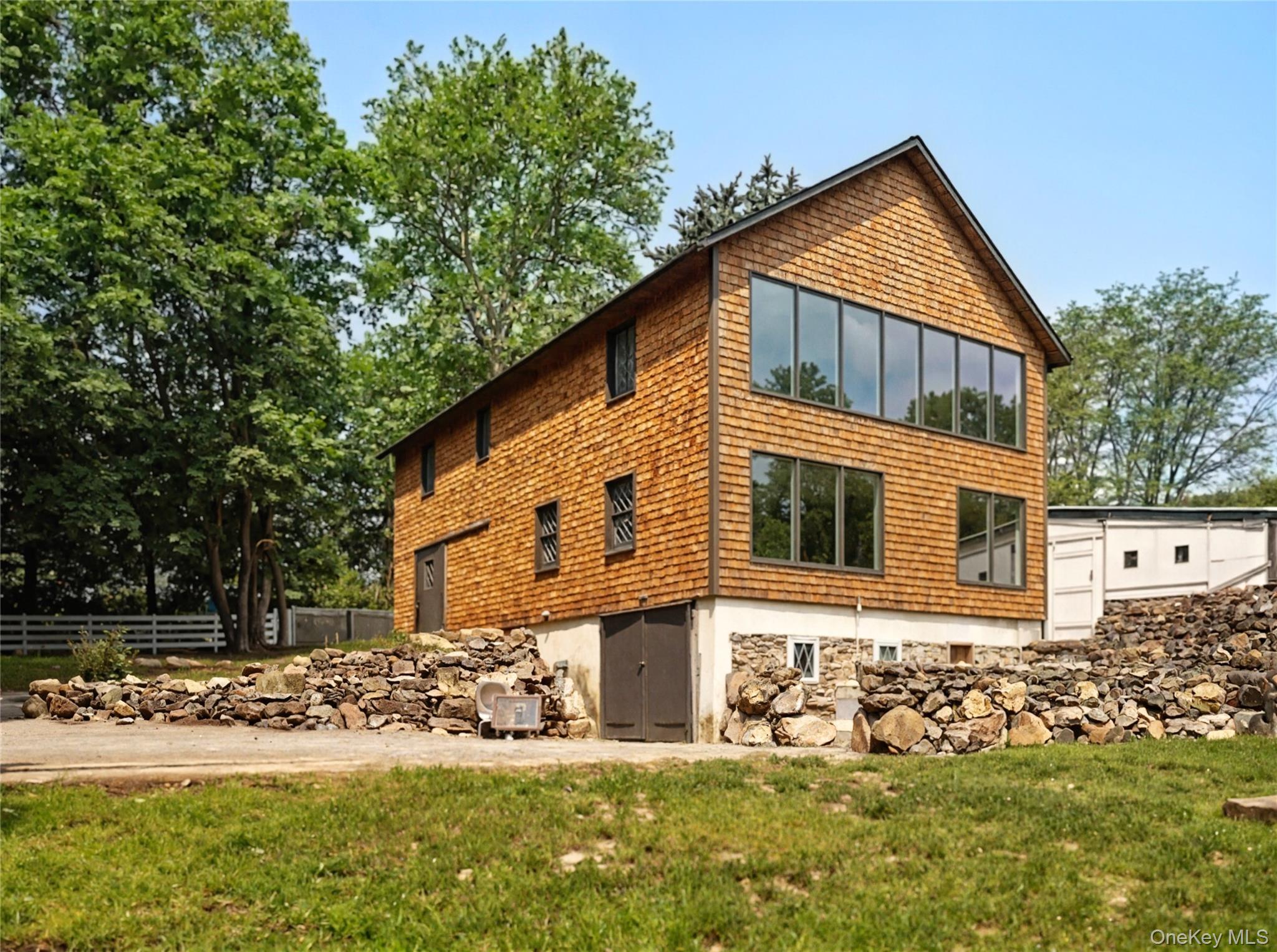310 Mt Holly Road, Unit A Katonah, NY 10536 - Photo 11 of 33 a front view of a house with a yard