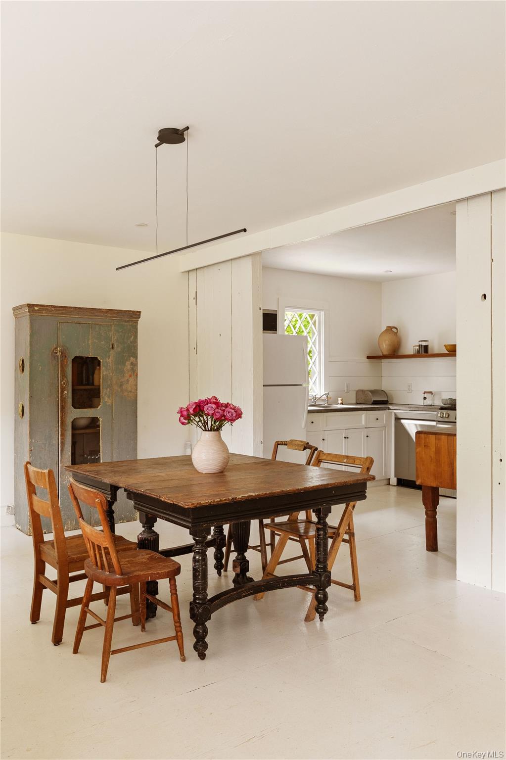 310 Mt Holly Road, Unit A Katonah, NY 10536 - Photo 16 of 33 a view of a dining room with furniture