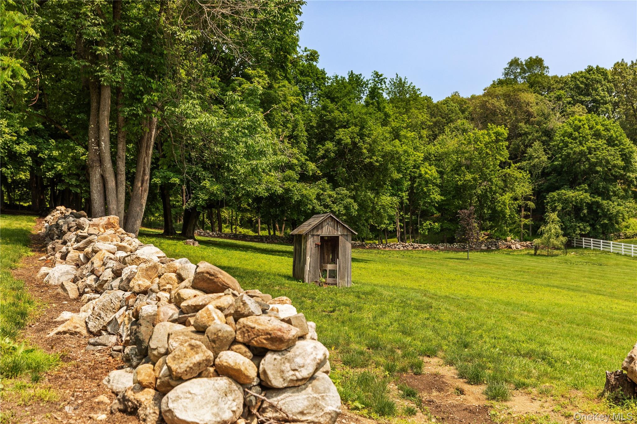 310 Mt Holly Road, Unit A Katonah, NY 10536 - Photo 28 of 33 a backyard of a house with lots of green space