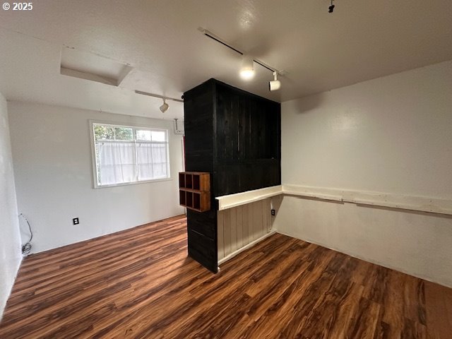 3932 Spruce Street Florence, OR 97439 - Photo 33 of 39 a view of an empty room with wooden floor and a window