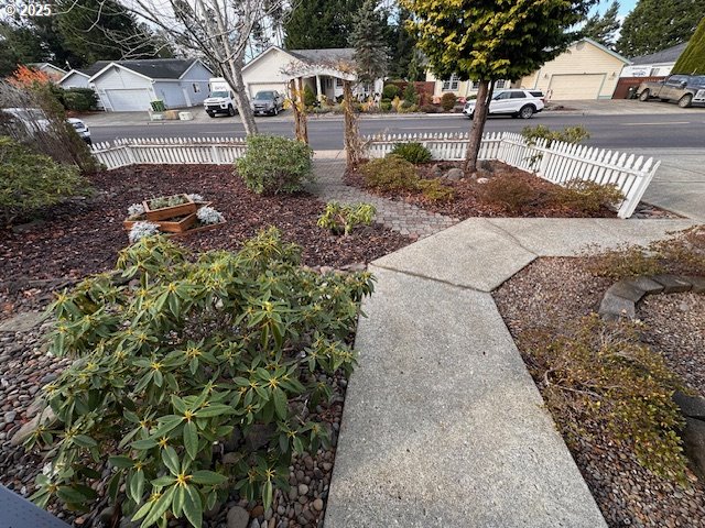 3932 Spruce Street Florence, OR 97439 - Photo 37 of 39 a view of a yard with plants and trees