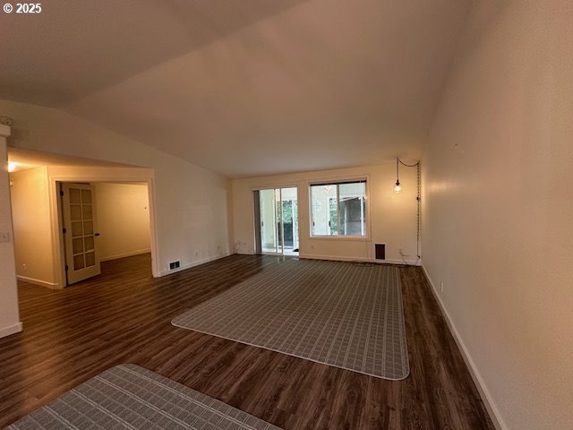 3932 Spruce Street Florence, OR 97439 - Photo 9 of 39 a view of a livingroom with wooden floor and staircase