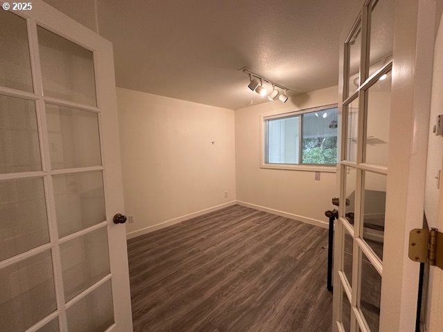 3932 Spruce Street Florence, OR 97439 - Photo 10 of 39 a view of a room with wooden floor and window