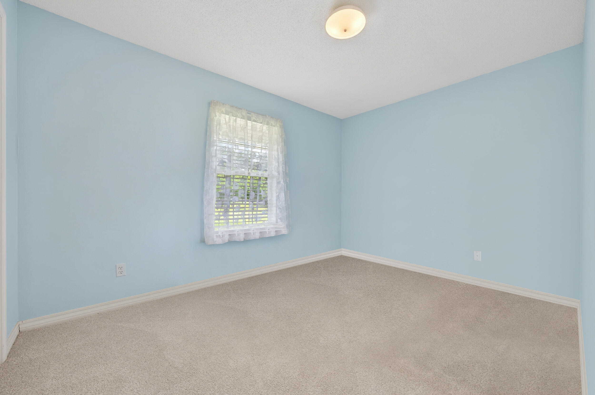 5589 Chalker Road Molino, FL 32577 - Photo 17 of 38 an empty room with windows