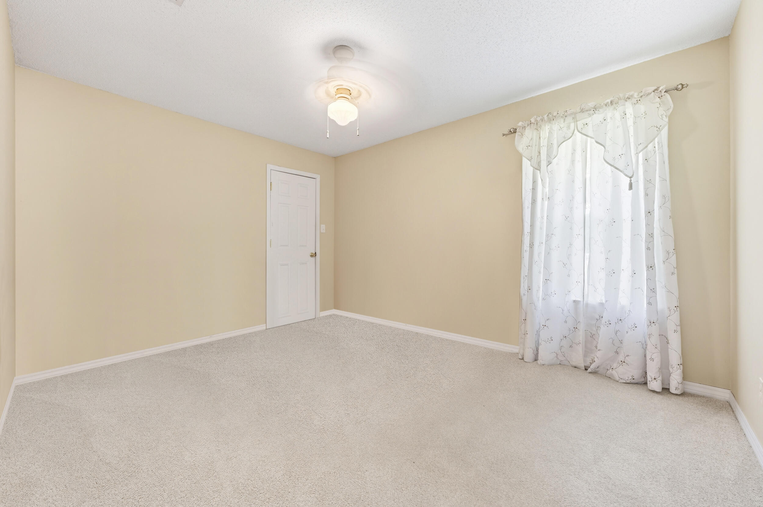 5589 Chalker Road Molino, FL 32577 - Photo 18 of 38 an empty room with a empty space and a window