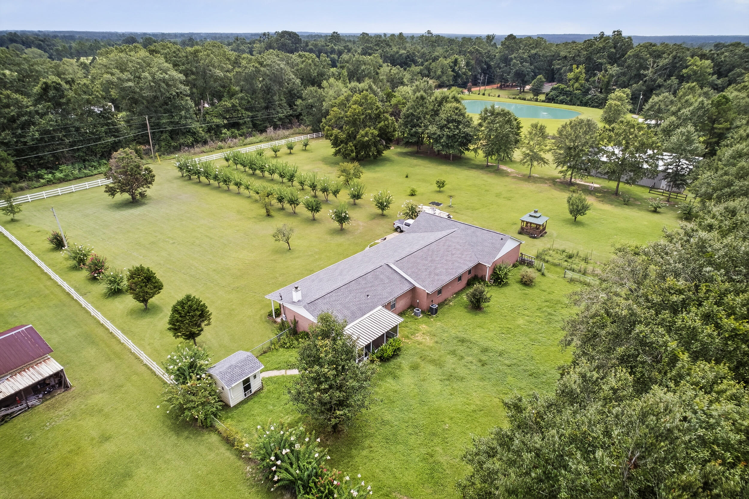 5589 Chalker Road Molino, FL 32577 - Photo 25 of 38 an aerial view of a house with outdoor space