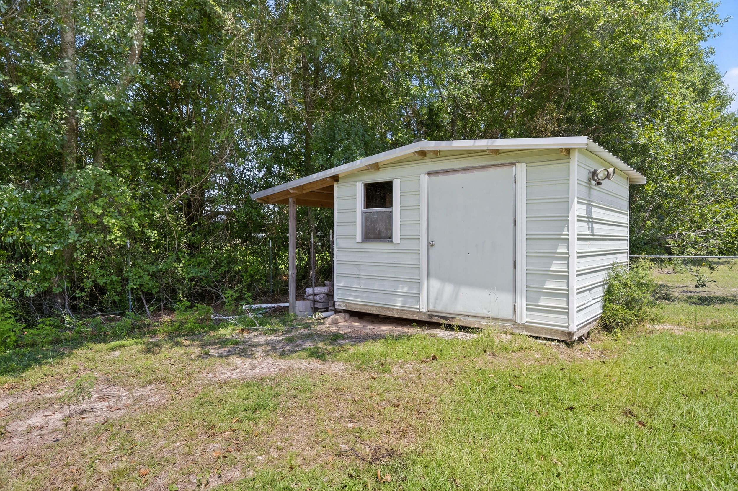 5589 Chalker Road Molino, FL 32577 - Photo 33 of 38 a view of a backyard