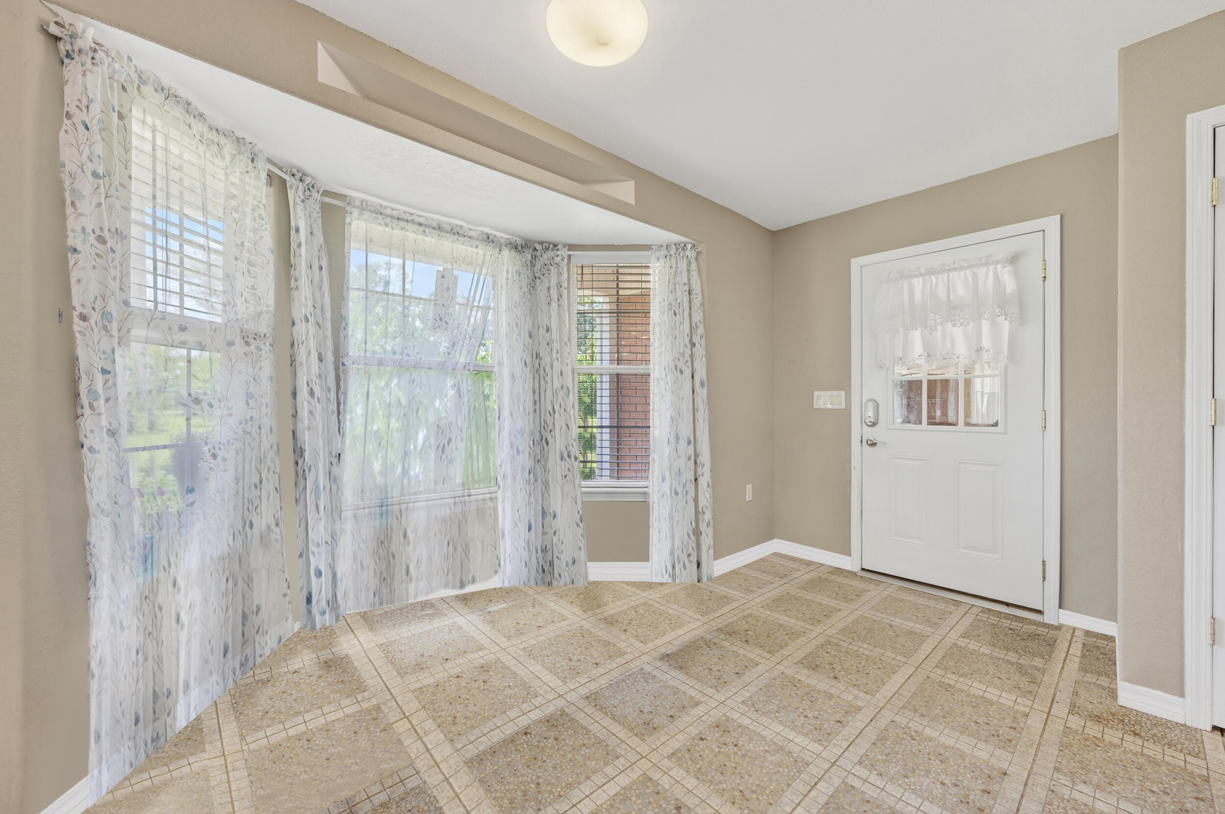 5589 Chalker Road Molino, FL 32577 - Photo 5 of 38 a view of an empty room with a window