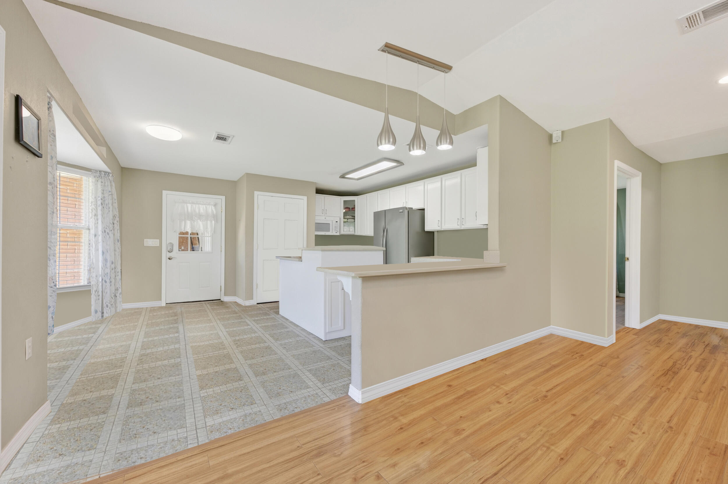 5589 Chalker Road Molino, FL 32577 - Photo 6 of 38 a view of a kitchen with wooden floor and a kitchen